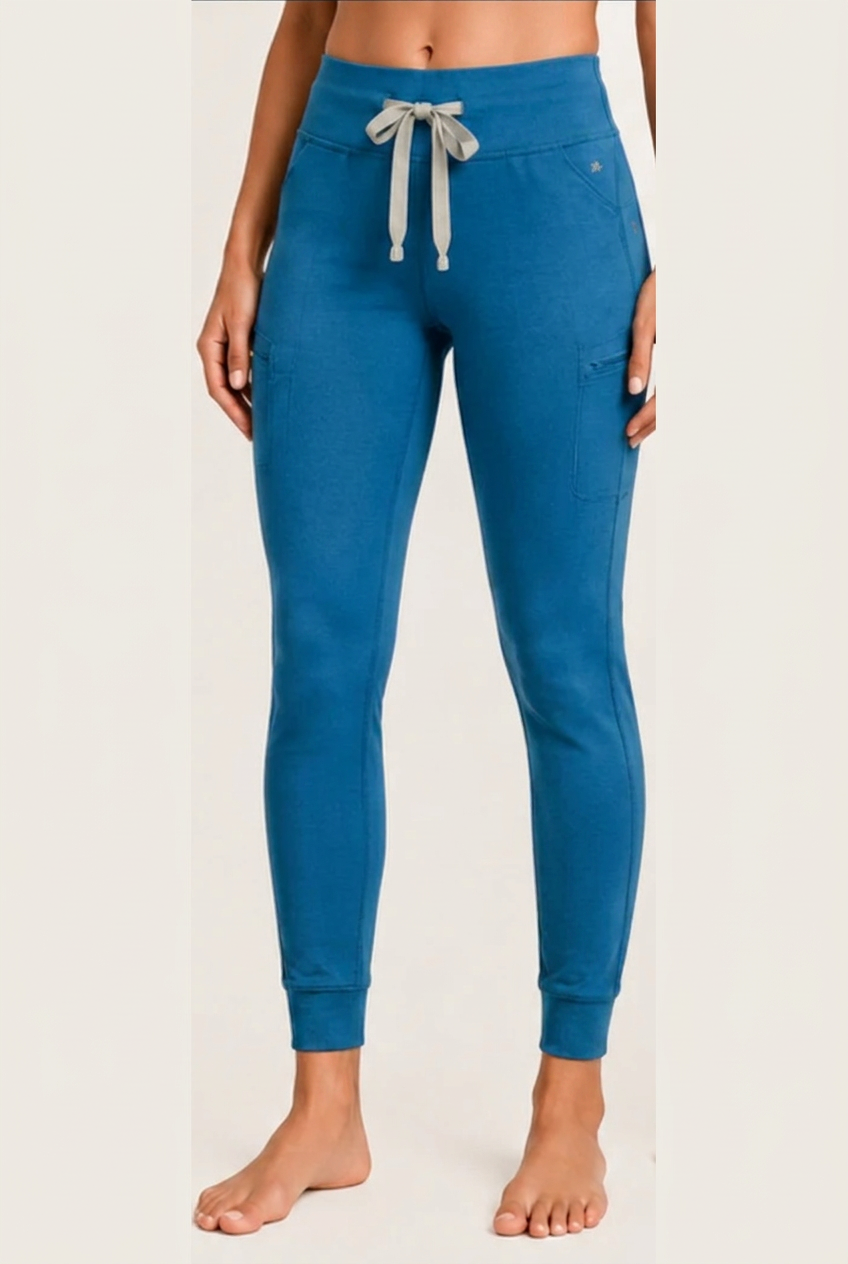 The Clover Legging in Cerulean Blue, shown from waistband to cuffed ankle